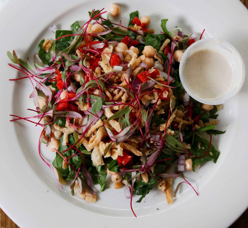 Garbanzo Bean Salad · Garbanzo beans, spinach, microgreens, roasted bell peppers, shallots, served with a side of house-made lemon tahini dressing.