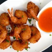 Coconut Shrimp · Golden-fired shrimps coated with breadcrumbs and coconut flake serve with signature sweet an...