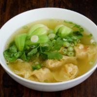 Won Ton Soup · Stuffed marinated ground pork and shrimps with bok choy on top with garlic oil and garnish.