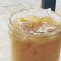 Iced Chai Tea Latte · Homemade chai and whole milk on ice
