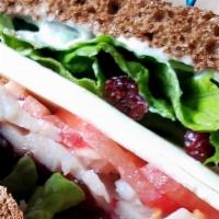 Turkey Cranberry Sandwich. · Turkey breast, provolone cheese, tomato, lettuce, dried cranberries, cranberry sauce and may...