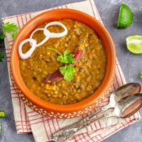 Dal Makhani · Creamy whole black lentils slow cooked with garlic, onions, ginger and our special blend of ...