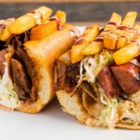 Sloppy Bbq Brisket & Sausage · Baguette, beef brisket, sausage, barbecue sauce, chipotle sauce, coleslaw, crispy fries.