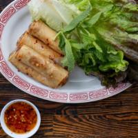 Springs Rolls · Crispy veggie spring rolls filled with cabbage, green beans, vermicelli, and tofu bean curd....