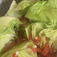Wedge Salad · Towns version of the classic wedge. Iceberg, fresh diced tomatoes, bacon, and blue cheese tw...