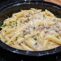 Penne, Sausage Cream · Penne with Italian sausage and peas in a light cream sauce