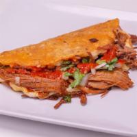 Quesa Birria  · Large corn tortilla taco made with melted cheese on the tortilla and delicious birria, onion...