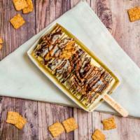 Cinnamon Toast Horchata · Dairy Horchata Paleta, Full Dipped in White Chocolate topped with Cinnamon Toast Crunch, dri...