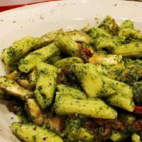 Penne Pasto & Chicken · Penne pasta, grilled chicken breast and sun-dried tomato, baked in pesto sauce.
