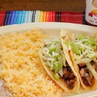 2 Hard Shell Taco Combo Plate · Choice of meat, lettuce, cheese and guacamole. Served with rice and beans.