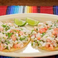 Tostadas De Ceviche · Fish marinated with lemon juice, and chopped mixed vegetables.