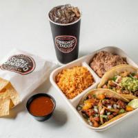 2 Taco Plate · Includes two tacos with a side rice & beans