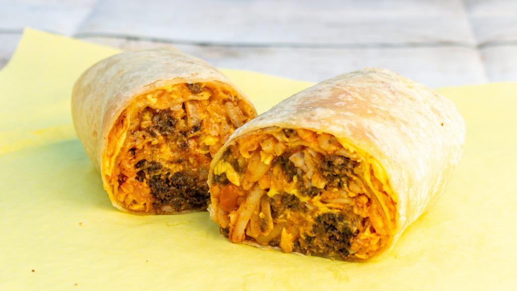 Soujouk Burrito · Soujouk (spiced halal beef), tomatoes, eggs, hashbrown, cheese.