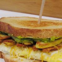 Breakfast Sandwich · Egg, chicken, guacamole, spinach and cheese.