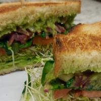 Guacamole Veggie Sandwich (Vegan) · Guacamole, spinach, zucchini, alfalfa sprouts, tomatoes, onions, romaine lettuce and cucumbers