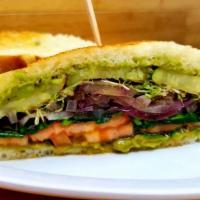Veggie Delight Sandwich  (Vegan) · Guacamole, onions, eggplant grilled, cucumbers,cabbage, tomato grilled, alfalfa sprouts,roma...