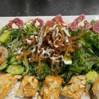 Seafood Salad · Salmon, shrimp, tuna on spring mix and special dressing.