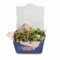 Side Lbw Salad · Fresh arugula, pecans, nut mix, cucumbers, and roasted red peppers all tossed in housemade p...