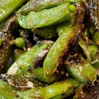 Shishito Peppers · We blister these East Asian peppers to perfection in olive oil, salt, pepper and finish with...