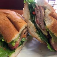 Beef Banh-Mi · Vietnamese sandwich, French bread baguette with beef, Vietnamese ham, Lettuce romaine, spicy...