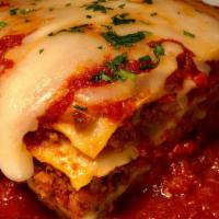 Meat Lasagna · Lean beef, ground pork, mozzarella, parmigiano,bechamel, homemade marinara sauce & basil