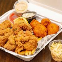 Fried Catfish Platter · Hot/popular. With golden fried catfish strips, French fries, four hush puppies, and cole slaw.