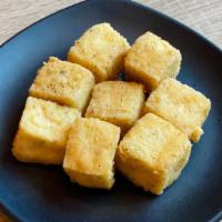 Side Of Fried Tofu · One serving of fried tofu. Served with a side of garlic soy sauce.
