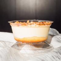 Toasted Almond Cup · Sponge cake soaked in amaretto syrup, layered with mascarpone cream. Topped with amarettini ...