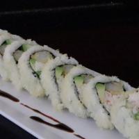 Crunch Roll · In - shrimp tempura, crabmeat, avocado, cucumber. Out - crunch flake. Eel sauce.