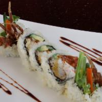 Spider Roll · In - deep-fried soft shell crab, crabmeat, radish sprout, gobo, avocado, cucumber. Out - cru...