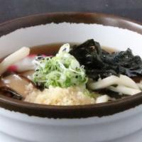 Udon Noodle Soup · Thick wheat-flour noodle soup in a mildly flavored soy sauce broth. Mushroom, fish cake, gre...