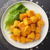 Tofu Wonder · Lightly fried tofu served crisp with chili sauce