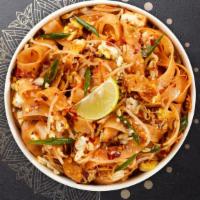 Tough Tofu Pad Thai · Tender tofu stir fried with eggs, scallions, bean sprouts, and crush peanuts in a tamarind s...