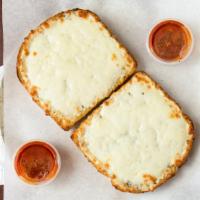 Garlic Bread · Bread, topped with garlic, herb seasoning, baked to perfection.