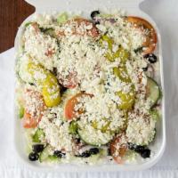 Md Greek Salad · Lettuce, tomatoes, black olives, pepperoncini, cucumbers, feta cheese.