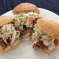 Pulled Pork Sandwich · Marinated BBQ Pulled Pork with fresh Coleslaw made in house