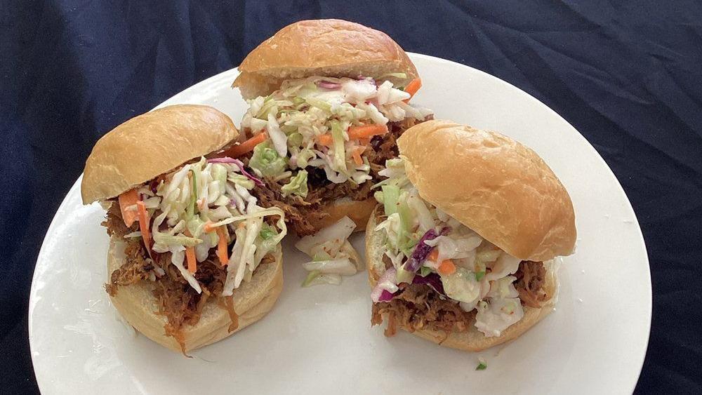 Pulled Pork Sandwich · Marinated BBQ Pulled Pork with fresh Coleslaw made in house