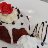 Red Velvet Bundt Cake · Rich Red Velvet Cake topped with Chocolate Chips and Creamy Buttercream Cream Cheese frostin...
