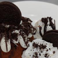 Cookies And Cream Delight · Delicious Cookies and Cream bundt cake covered in a rich Cream Cheese Buttercream, filled wi...