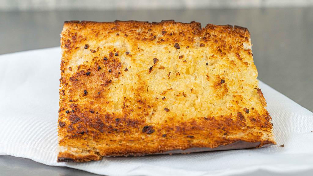 Garlic Bread · Signature French Bread covered in our Garlic Butter made in house