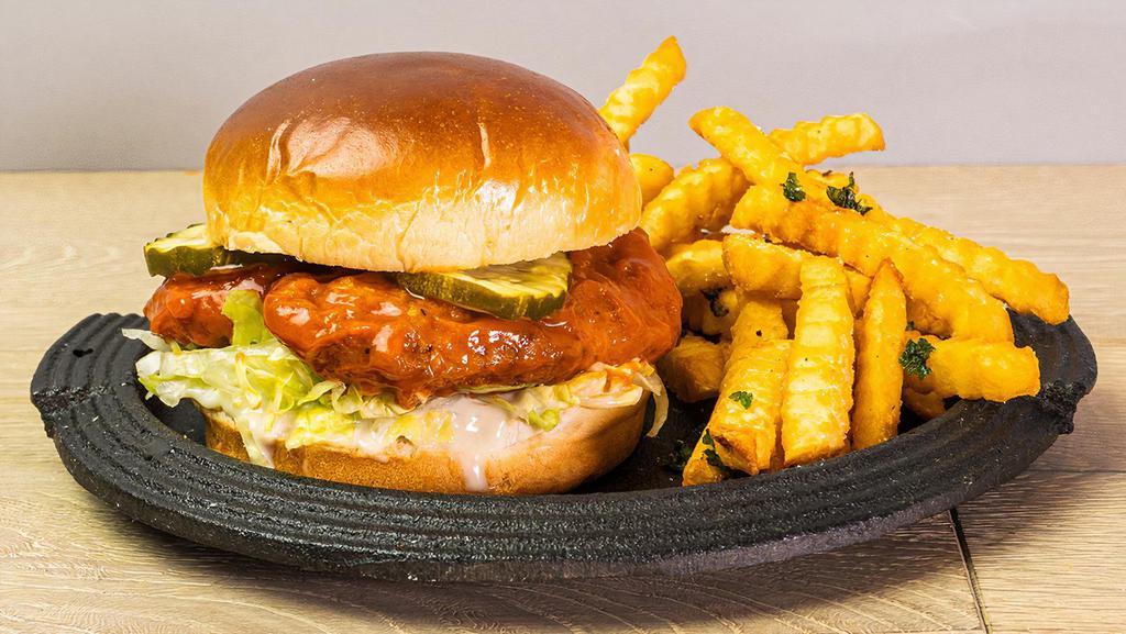 Truffle Chicken Sandwich  · Crispy chicken tenders drizzled with your choice of truffle sauce, shredded lettuce & pickles on a toasted brioche bun.