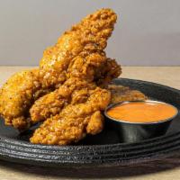 Truffle Tenders · 3 crispy chicken tenders tossed with your choice of truffle sauce