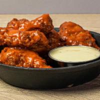 Truffle Wings · 6 chicken wings tossed with your choice of truffle sauce.