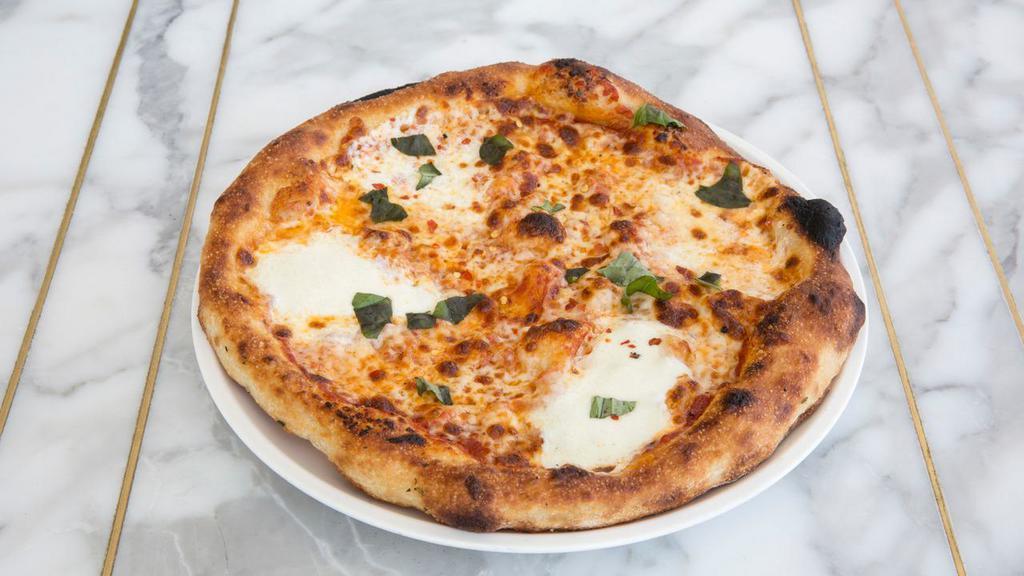 Margherita Pizza · San Marzano Tomato, Fresh Mozzarella, Torn Basil