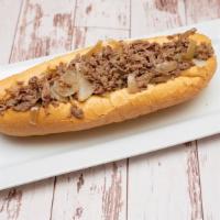 Traditional Philly Cheesesteak · Grilled onions.