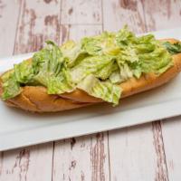 Chicken Caesar Cheesesteak · Romaine with Caesar dressing on a toasted roll.