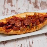 Italian Sausage Sub · Sweet Italian sausage, (sliced), grilled with peppers, onions, topped with pizza sauce, and ...