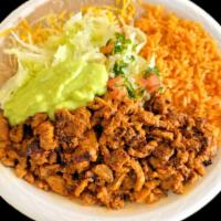 #16 Carne Adobada Plate · Served with rice and beans. Guacamole and pico De gallo. Corn or four tortillas on the side.