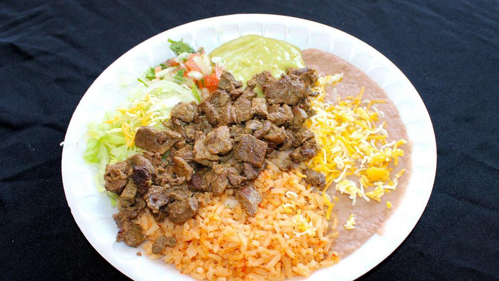 #15 Carne Asada Plate · Served with rice and beans.
