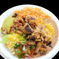#22 Grilled Chicken Plate · Served with rice and beans. Guacamole, pico De gallo. Side of tortillas. Corn or flour.